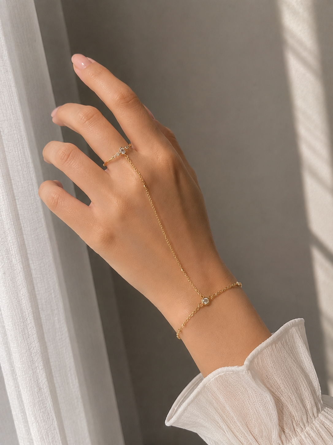Ring with bracelet