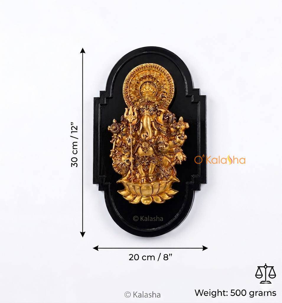 Subha Drishti Ganapati Wall Hanging – Antique Gold on Sleek Black Base (12 Inches)
